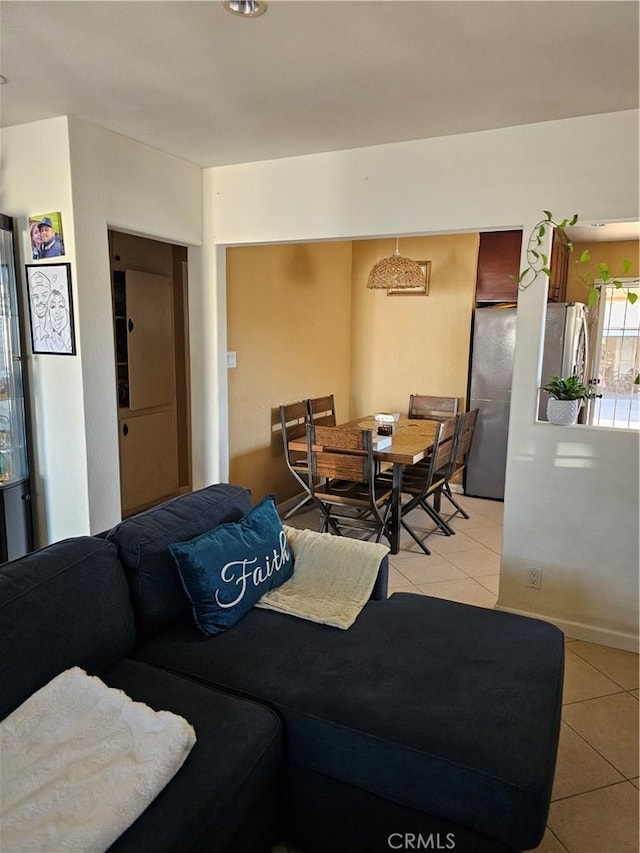 living room with light tile patterned floors