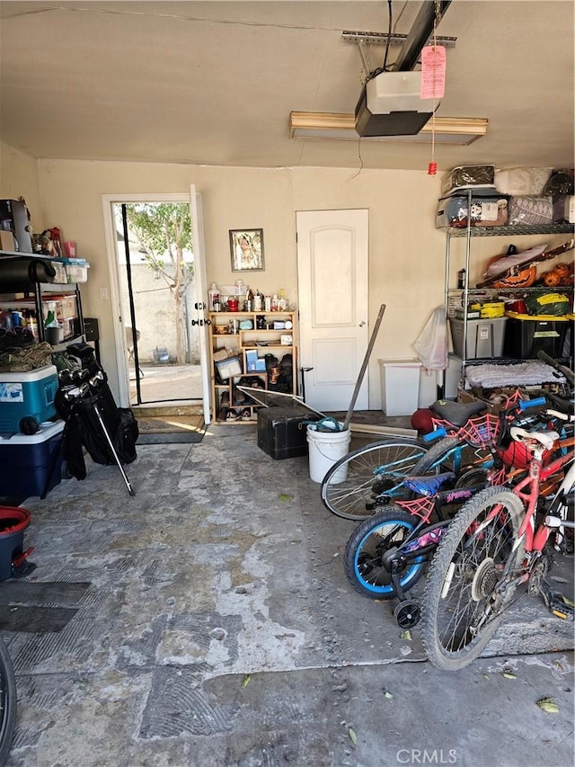 garage featuring a garage door opener