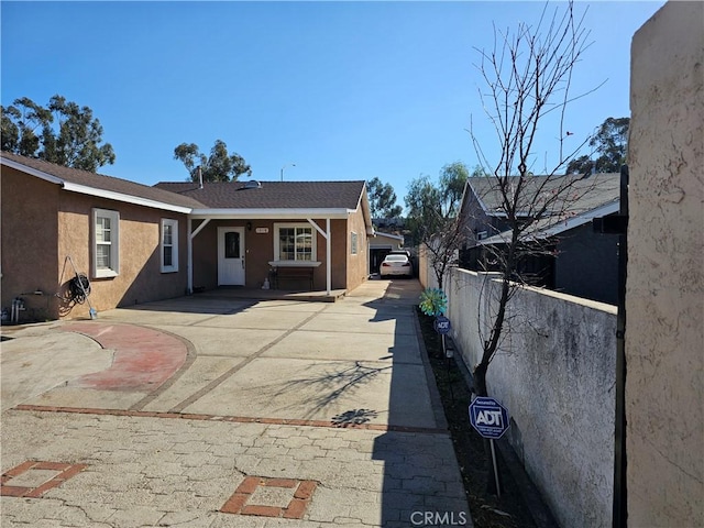 view of front of property featuring a patio