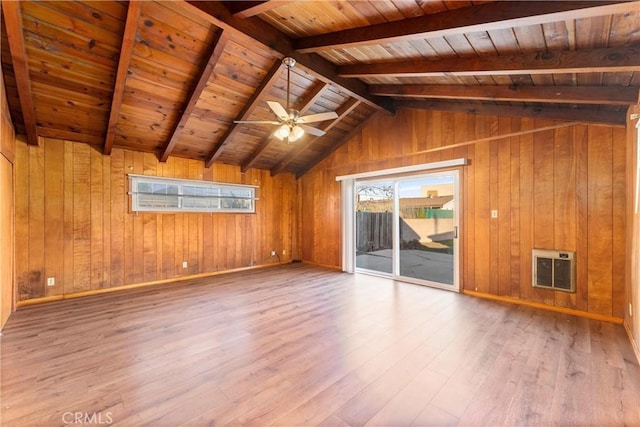 unfurnished living room featuring hardwood / wood-style floors, heating unit, wood ceiling, and vaulted ceiling with beams