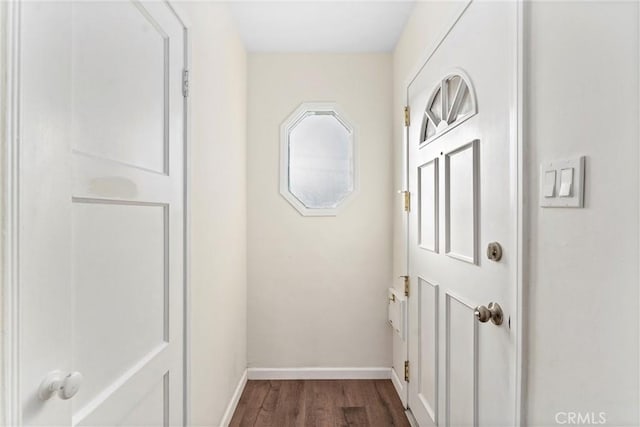 hallway featuring dark hardwood / wood-style flooring