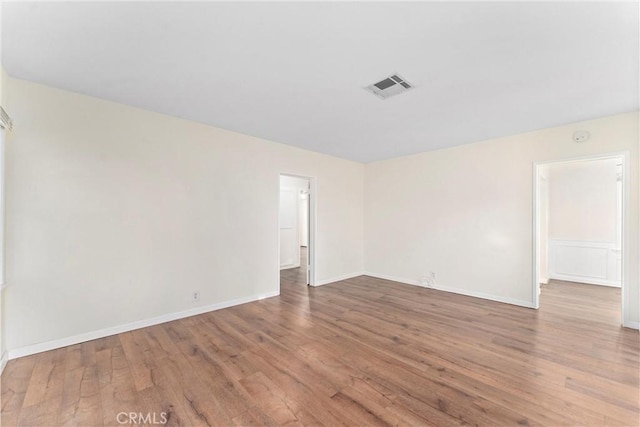 empty room featuring hardwood / wood-style floors