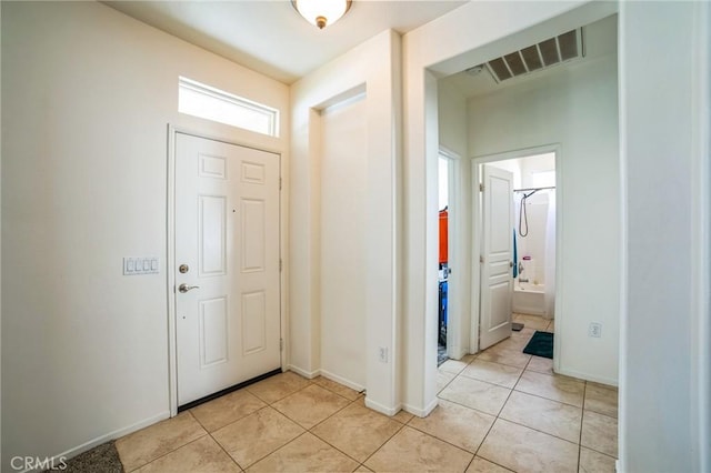 entrance foyer featuring light tile patterned floors