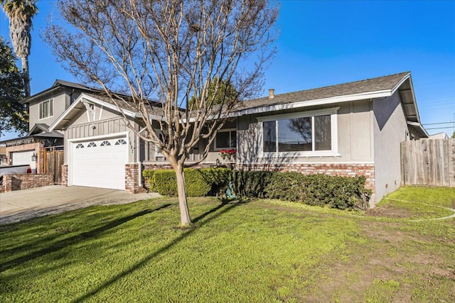 ranch-style home with a front yard and a garage