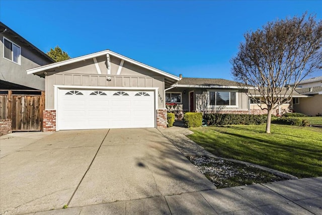 ranch-style house with a front lawn and a garage