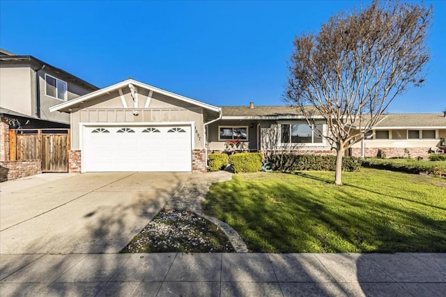 ranch-style home featuring a front yard and a garage