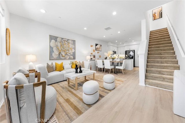 living room featuring light wood-type flooring