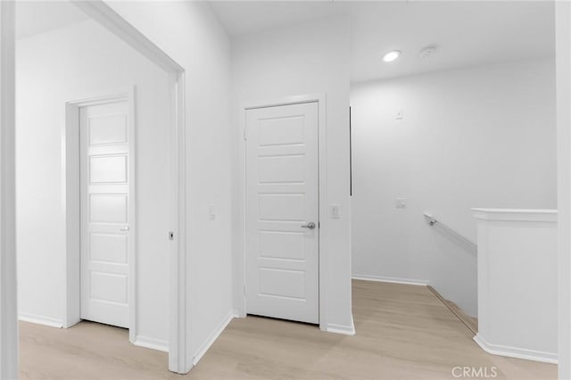 hallway featuring light wood-type flooring