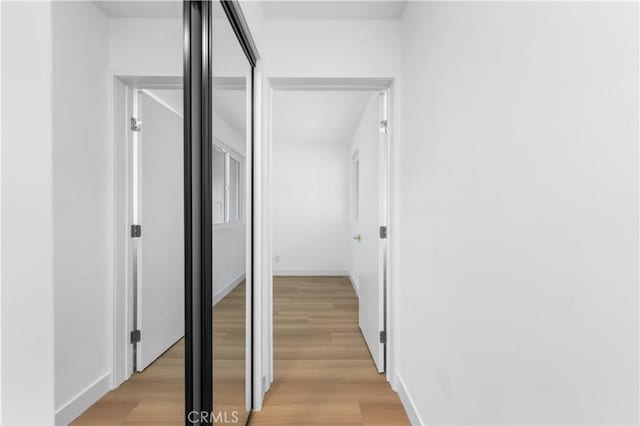 hall featuring light hardwood / wood-style flooring