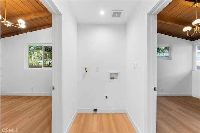 washroom featuring hookup for a washing machine, wood ceiling, an inviting chandelier, and electric dryer hookup