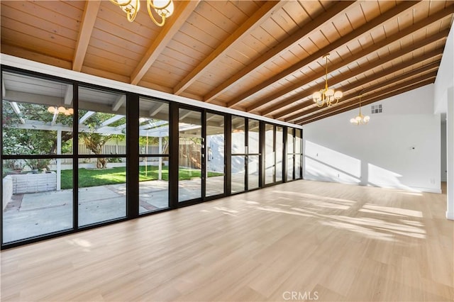 interior space with expansive windows, lofted ceiling with beams, a notable chandelier, and wooden ceiling