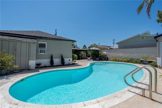 view of pool featuring a patio