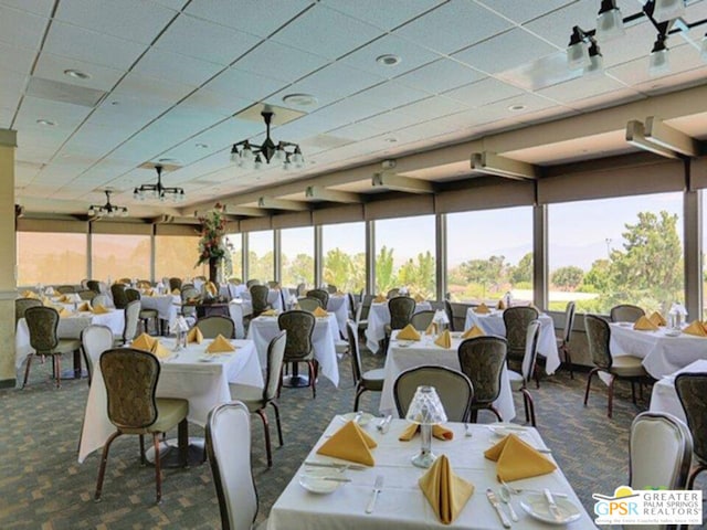 dining space with dark carpet