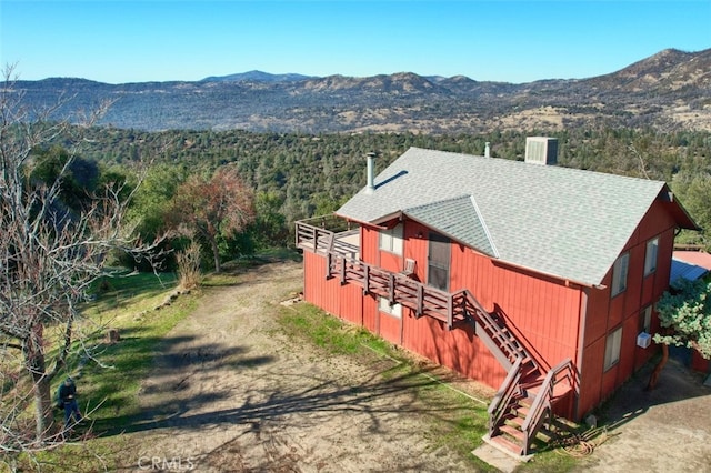 drone / aerial view featuring a mountain view