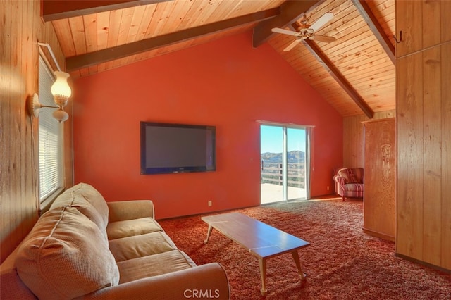 living room featuring beam ceiling, ceiling fan, carpet, and wooden ceiling