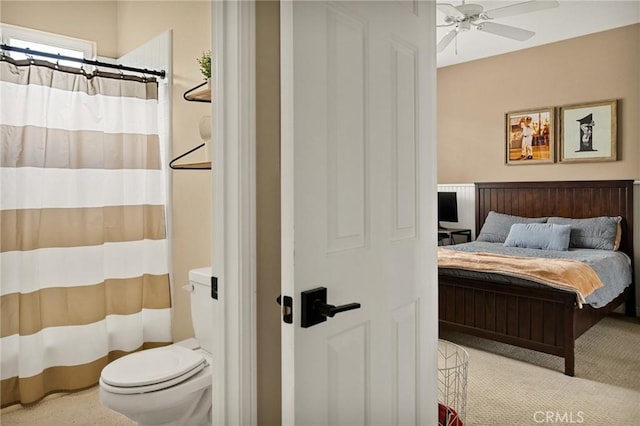 carpeted bedroom with ceiling fan