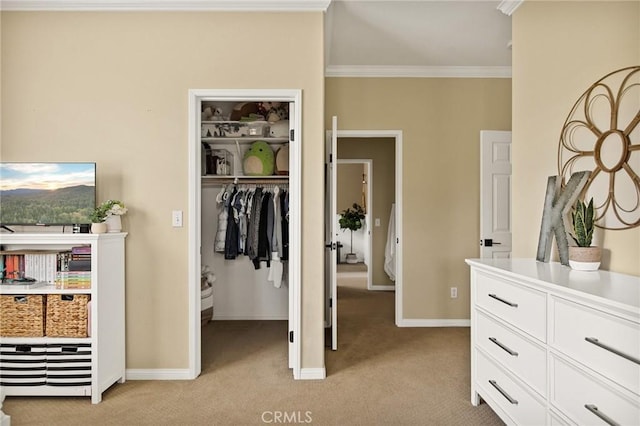 interior space featuring light colored carpet, a closet, and ornamental molding