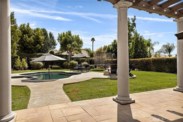 view of patio with a fenced in pool