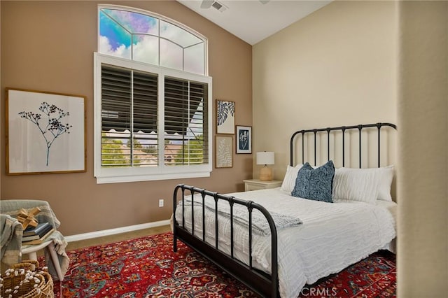 bedroom with vaulted ceiling