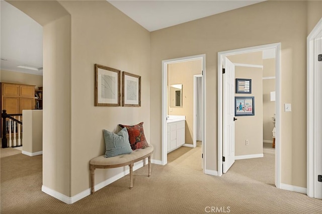 hallway with light carpet