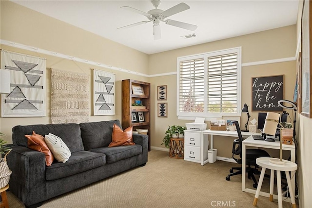 office space featuring carpet and ceiling fan