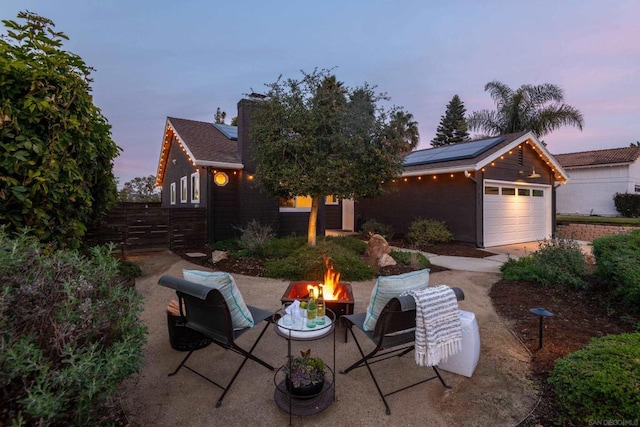 view of front of home with solar panels