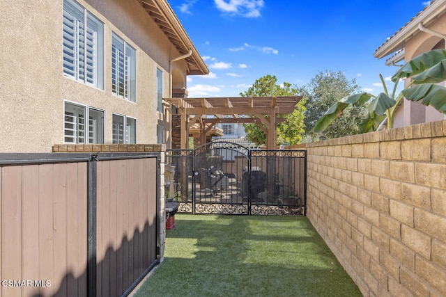 view of yard with a pergola