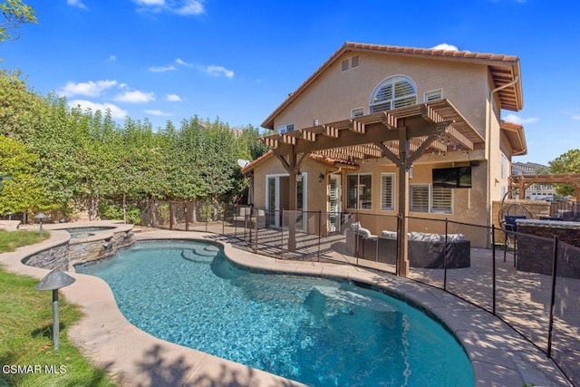 view of swimming pool with a pergola, a patio area, and an in ground hot tub