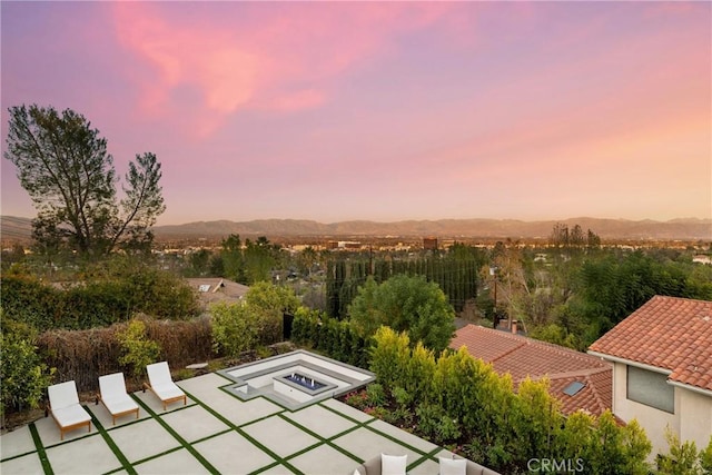 exterior space featuring a mountain view