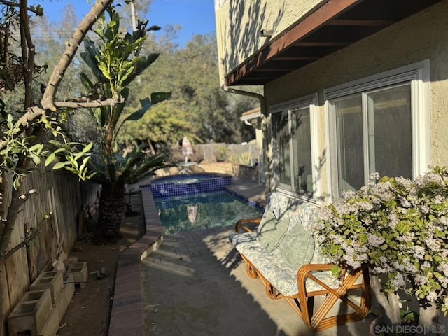 exterior space featuring a fenced in pool