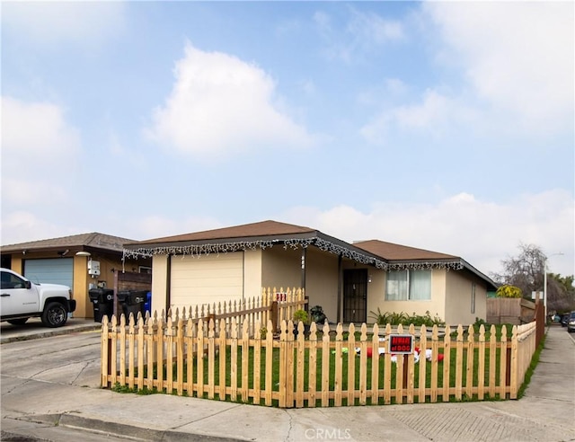 view of front of property with a garage