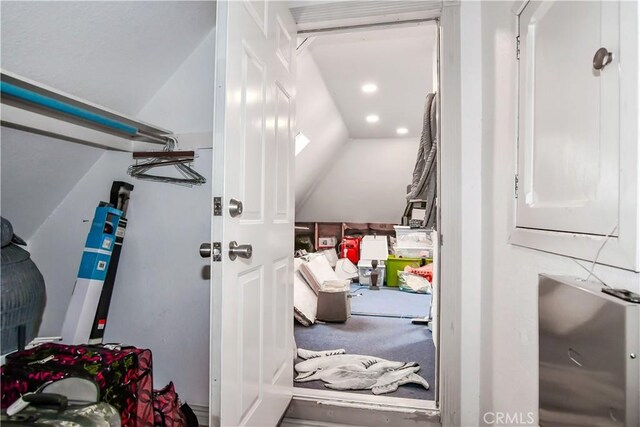 interior space featuring lofted ceiling