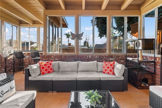 sunroom / solarium with wood ceiling and beam ceiling