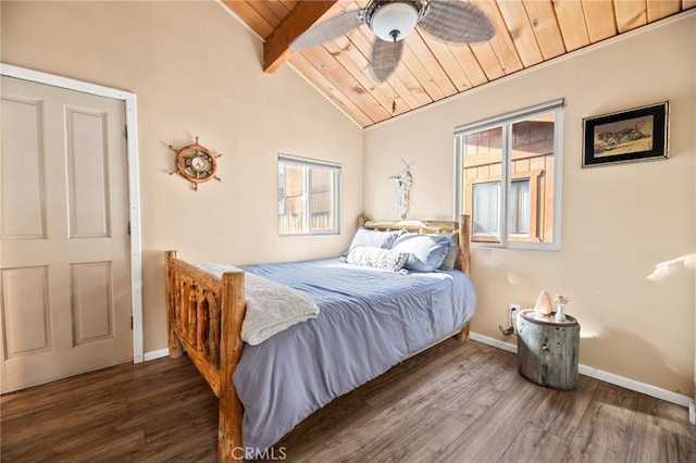 bedroom with lofted ceiling with beams, ceiling fan, dark wood-type flooring, and wood ceiling