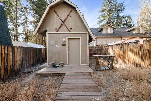 rear view of house with a shed