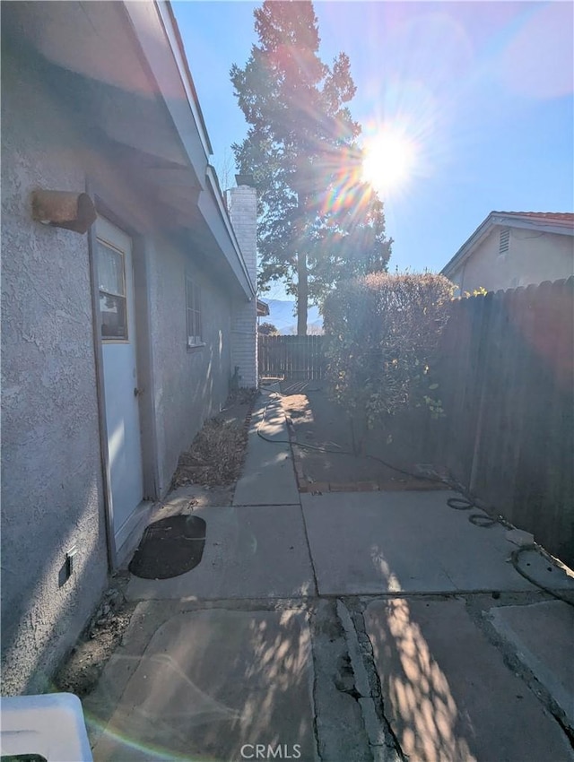 view of patio with fence