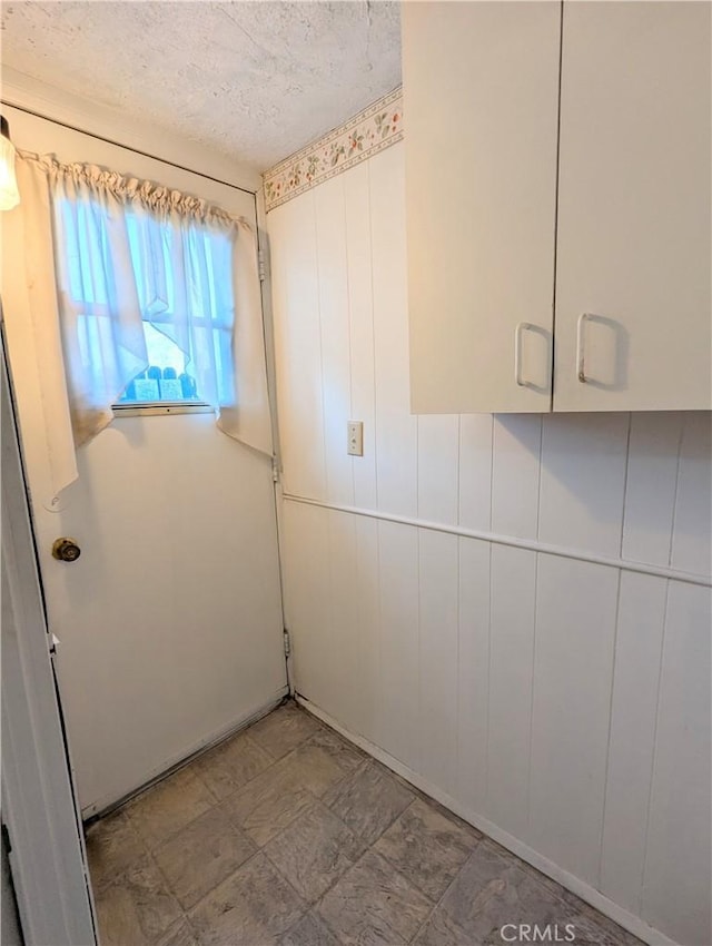 empty room featuring a textured ceiling