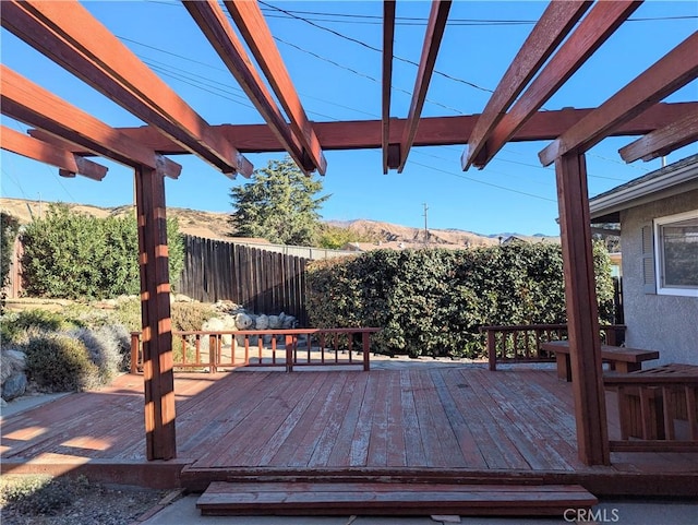 wooden terrace featuring a pergola