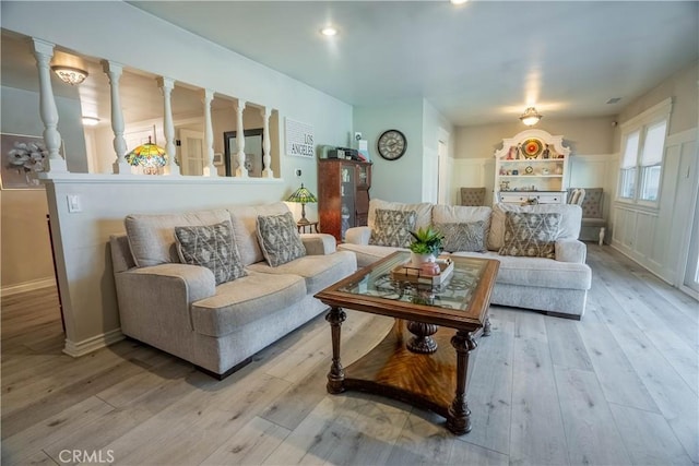 living room with light hardwood / wood-style floors