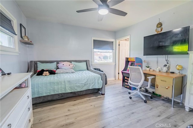 bedroom featuring ceiling fan and light hardwood / wood-style floors