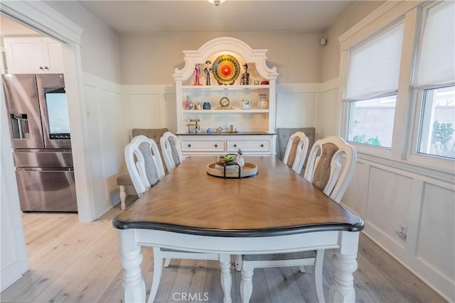 dining space featuring light hardwood / wood-style floors