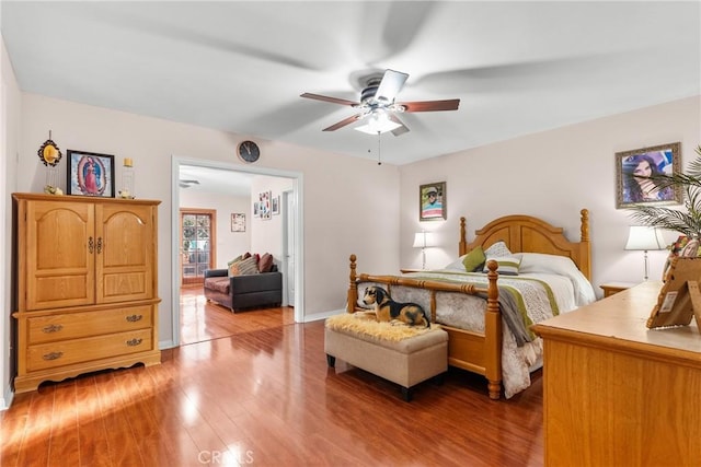 bedroom featuring hardwood / wood-style flooring and ceiling fan