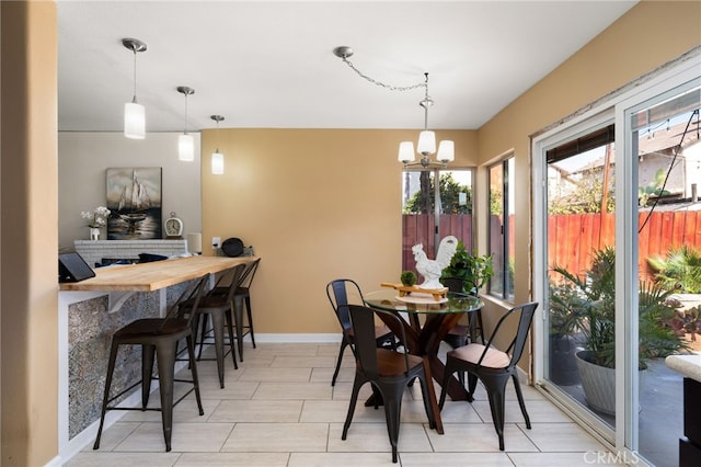 dining room featuring a notable chandelier