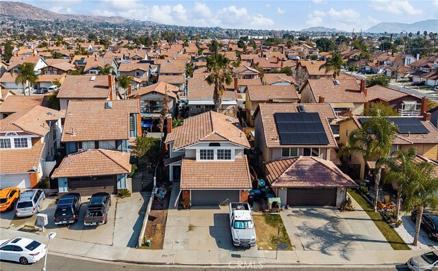 bird's eye view featuring a residential view and a mountain view