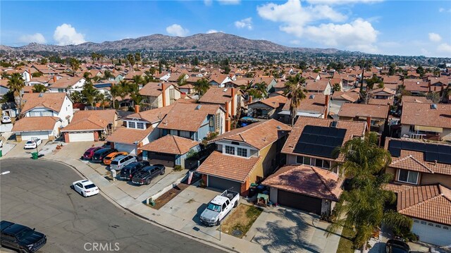 drone / aerial view with a mountain view and a residential view