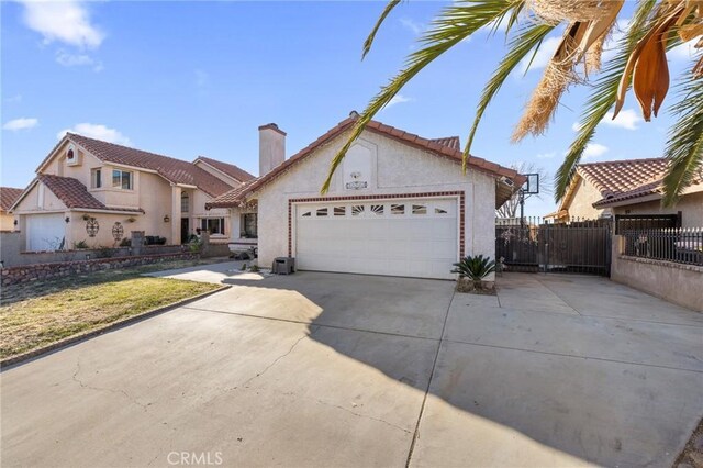 view of front of property with a front lawn and a garage