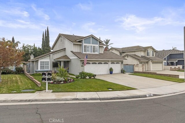 view of front facade with a front yard and a garage