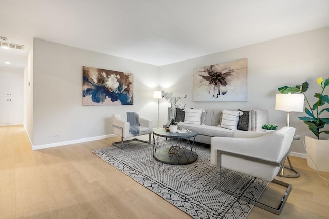 living room with light hardwood / wood-style floors