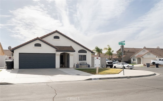 view of front of property with a garage