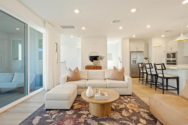 living room with light wood-type flooring